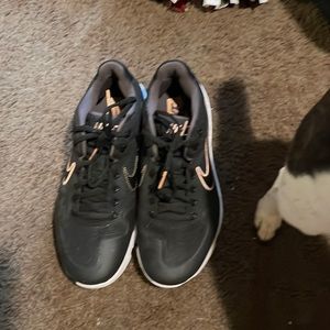 Black Nike turf shoes